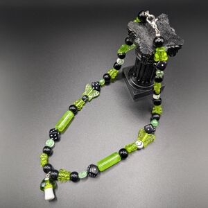 Green Beaded Necklace with Butterfly Charm